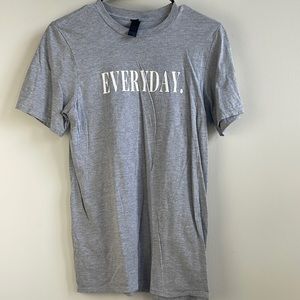 “Thank God Daily” streetwear casual style settings. Grey shirt white writing